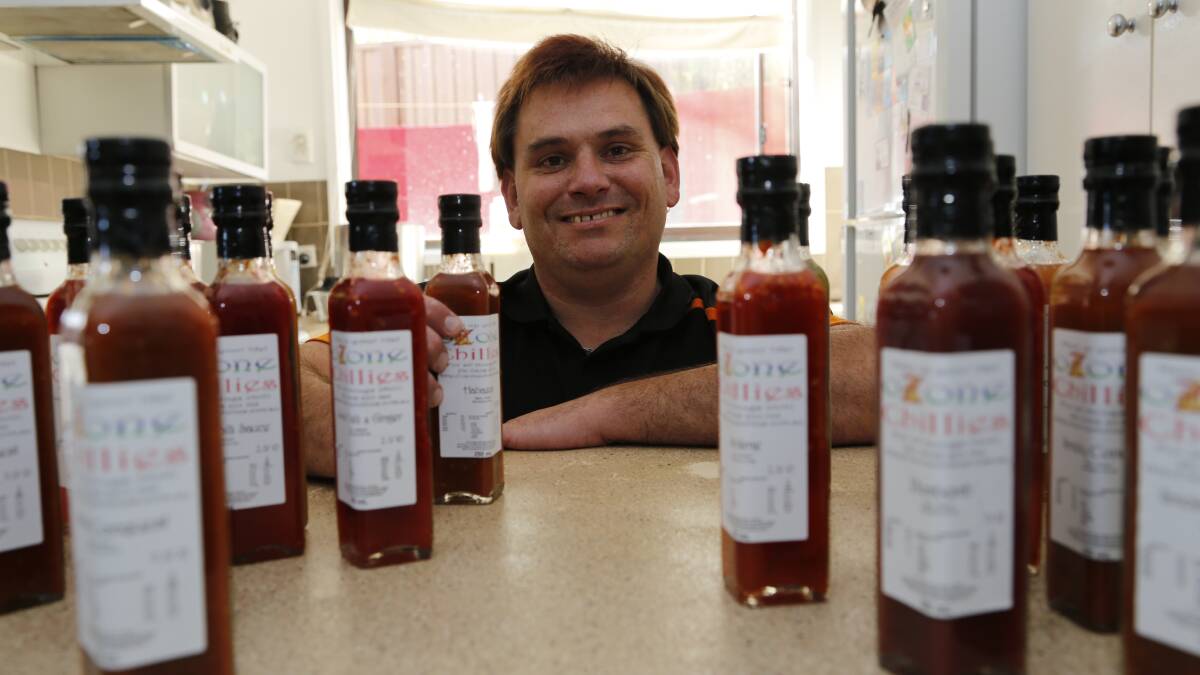 Owen Parsons was able to use his redundancy payout to launch his own business, Ozone Chillies. Photo: Kim Pham.