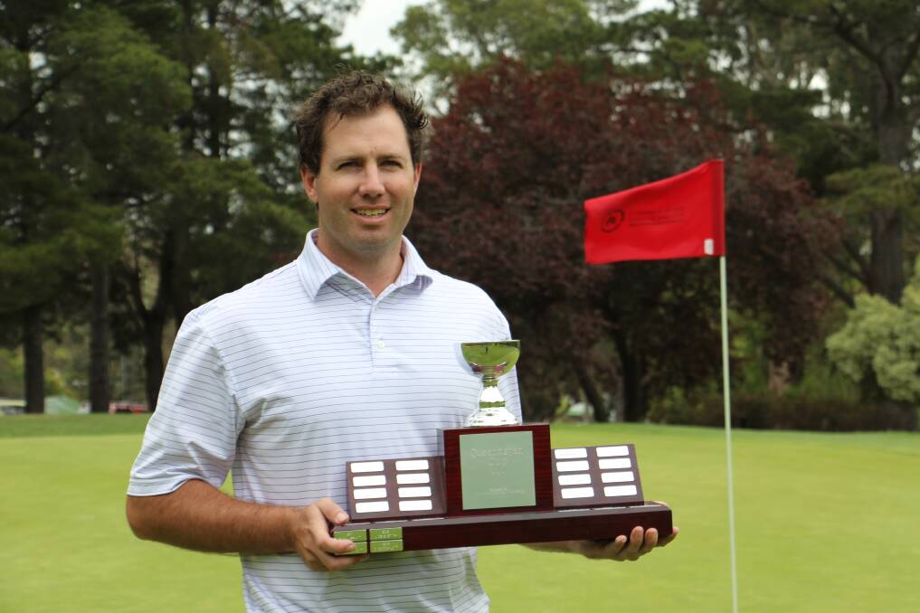 Queanbeyan Head Professional Jake Nagle, with the trophy for this weekend's winner of the Queanbeyan Cup. Photo: Miles Thompson