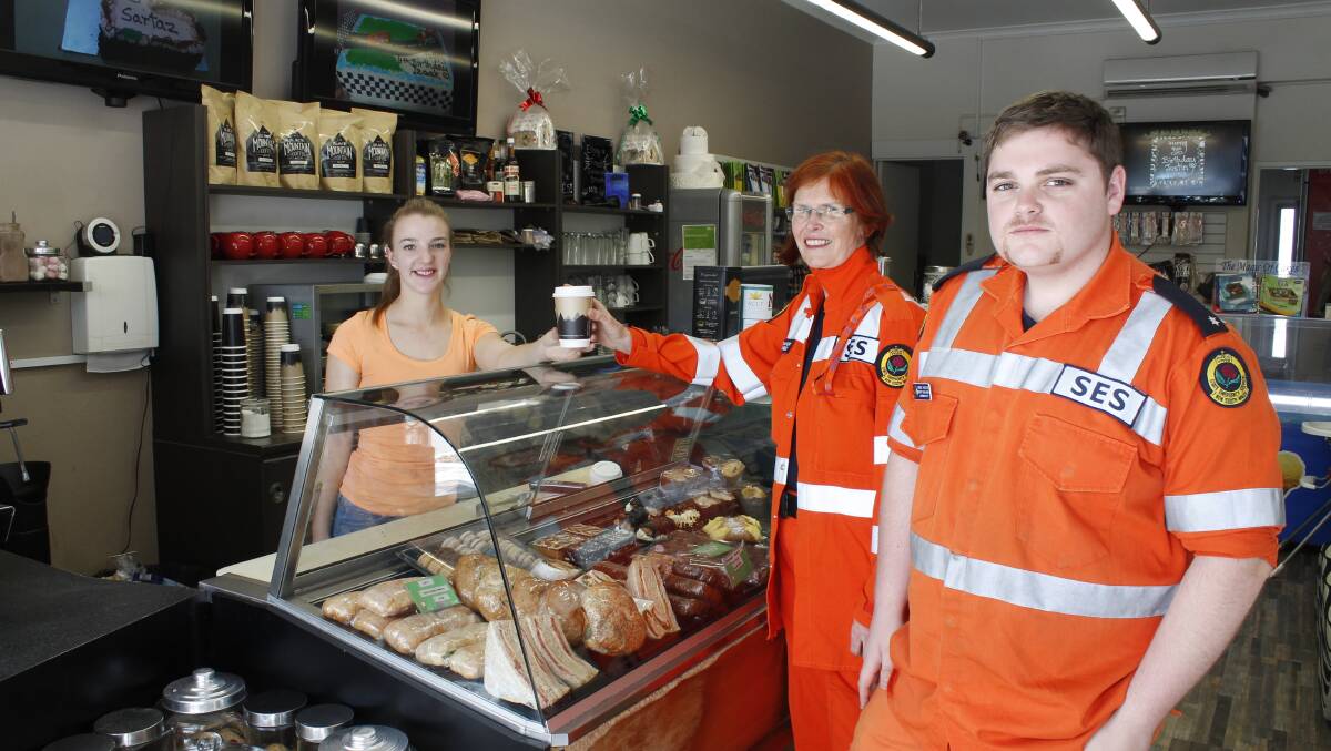 SES volunteers Stephanie Rayment, Cassandra Philpot and Brent Hunter at Ciao Cafe and Cakes.