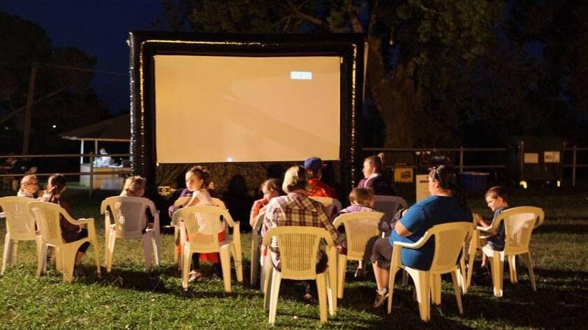 Phil Nichols' Jerrabomberra-based business, Indoor/Outdoor Cinemas, allows customers to enjoy night of movies underneath the stars. Photo: supplied.