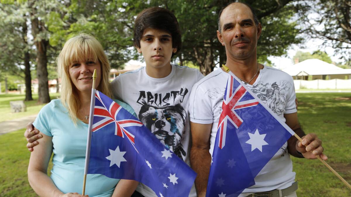 Adelino Vaz with his son David and wife Marie will become Australian Citizens on Australia Day. Photo: Kim Pham.
