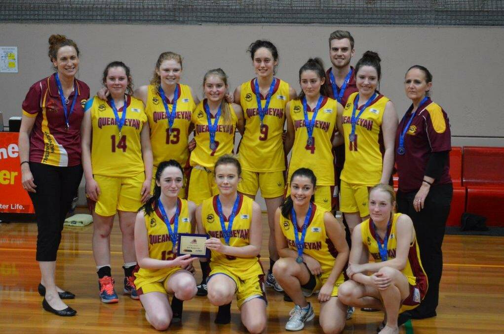 Qbn basketball celebrates another club first
