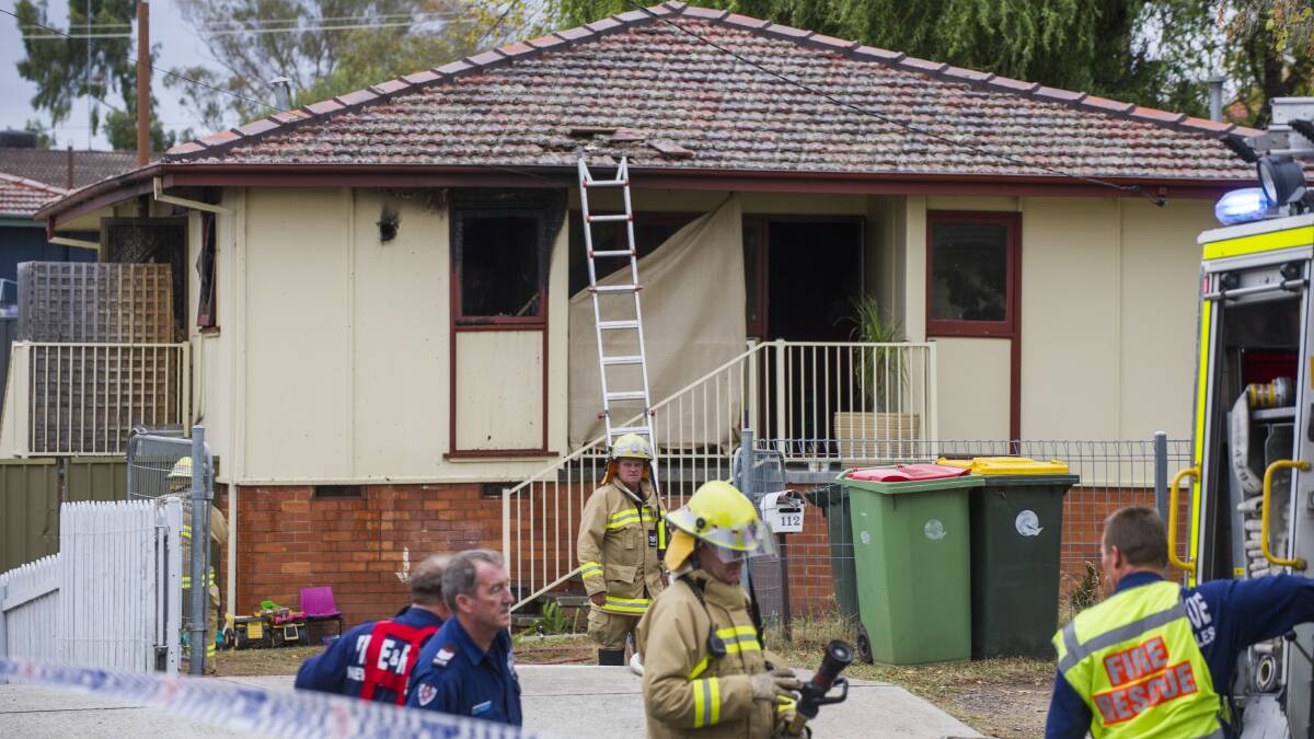Fire crews at the site of a house fire at Cameron Road, Karabar on Wednesday. Photo: Rohan Thomson, The Canberra Times.