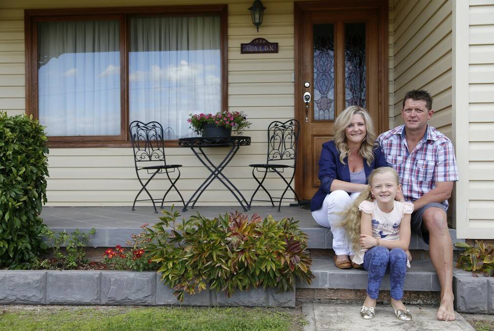 Shelly, David and Ruby Turner are the fifth generation of Turners to live at this cottage on Stornaway Road, Queanbeyan. Photo: Kim Pham.