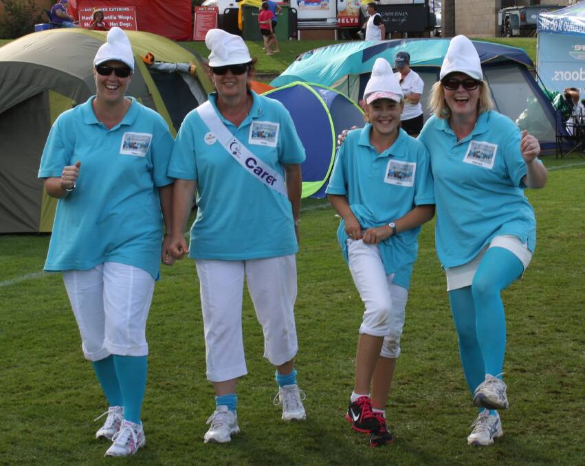 Megan Clark, Cathy Croker, Oliver Clark and Rosemary Rapana of "The Smurfs" hitting the track at the 2014 Relay for Life. Photo: Glen Croker.