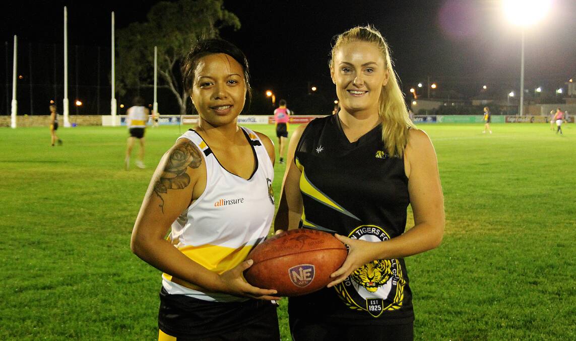 Premiership-winning Tigerettes Lani Watson and Ella Ross have embarked on their next footballing challenge through their participation in the GWS Giants Academy. Photo: Gemma Varcoe.