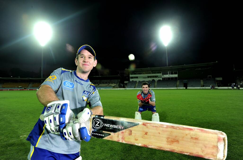 Batsman Aaron Ayre and wicket keeper Beau McClintock in 2013. Photo: Melissa Adams. 