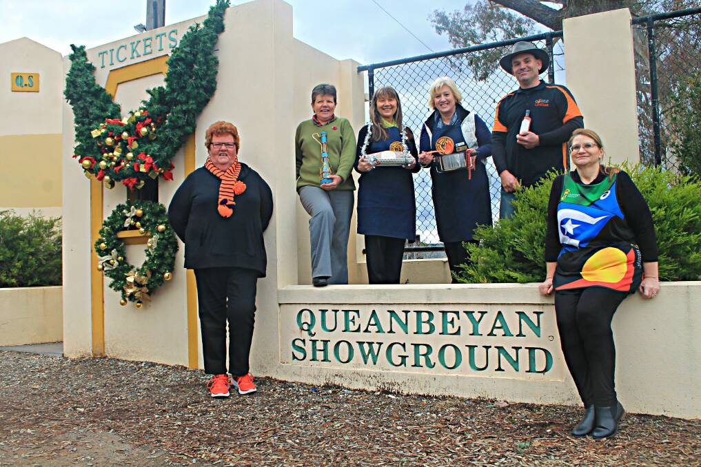 The 2016 installment of the Christmas in July Markets will feature tons of local produce from a number of vendors including (pictured from left to right) Nerida Murphy of the Queanbeyan Hospital Auxiliary, Helen Whigham of Eurotune Motorcycles, Lorraine Lasker and Chris Tarlinton of the CWA, Owen Parsons of Ozone Chillies, and Julia Smith of the Deadly Runners. Photo: Gemma Varcoe. 