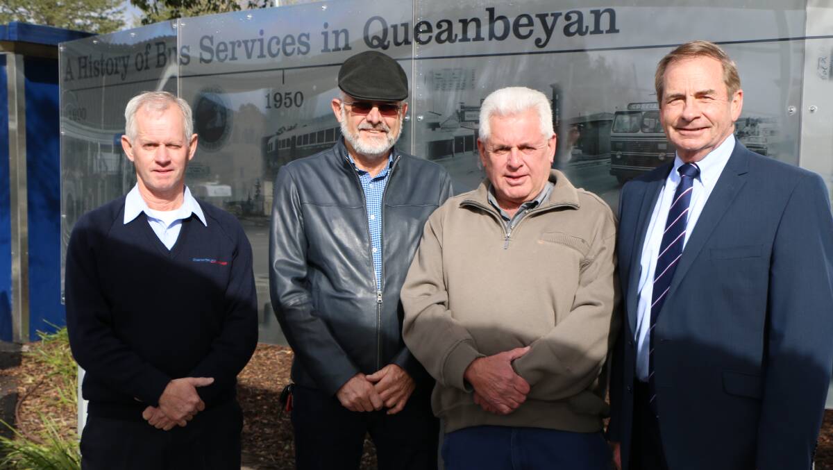 David, George and Tony Quodling and Queanbeyan-Palerang Regional Council Administrator, Mr Tim Overall with the historic display. Photo: Supplied.
