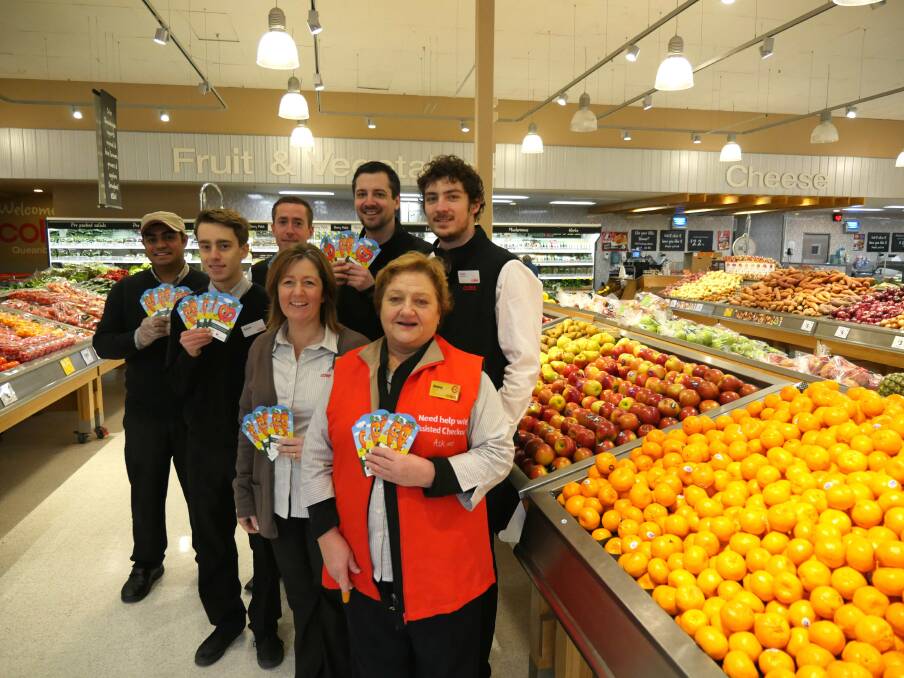 Coles Queanbeyan employees get on board with the charity campaign. Photo: Amanda Copp. 