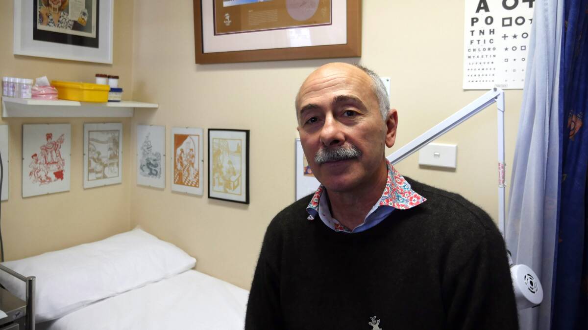 Dr John Azoury in his workplace at GP Super Clinic on Crawford Street. Photo: Amanda Copp.