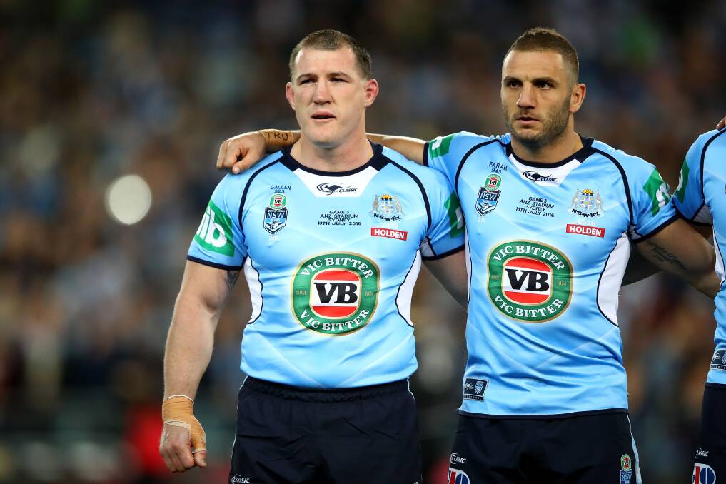 Blues skipper Paul Gallen, pictured alongside Robbie Farah, has won his final State of Origin match. Photo: Cameron Spencer/Getty Images. 