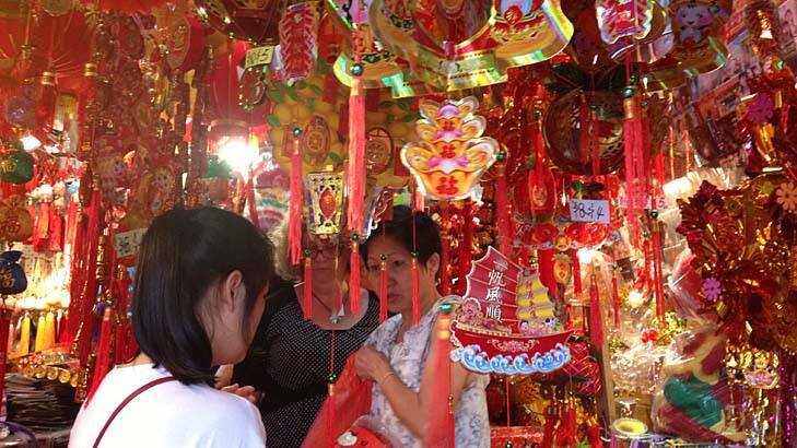 People shop in Chinatown ahead of Chinese New Year.