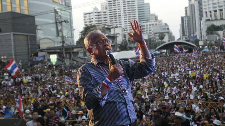 Anti-government protest leader Suthep Thaugsuban speaks to his supporters on Monday.