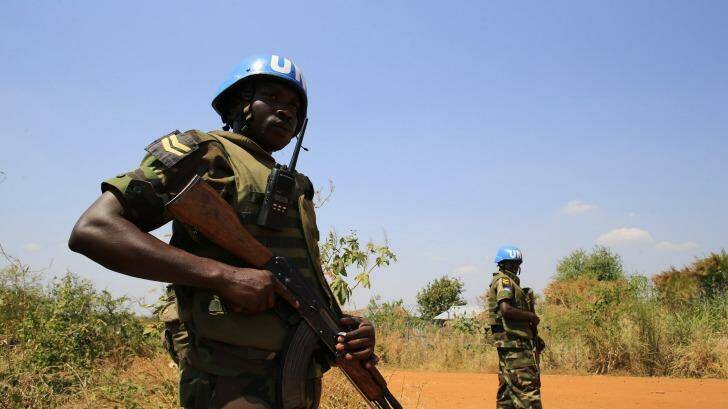Volatile situation ... United Nations Mission in Sudan (UNAMIS) personnel guard South Sudanese people displaced by recent fighting in Jabel, on the outskirts of that capital Juba.