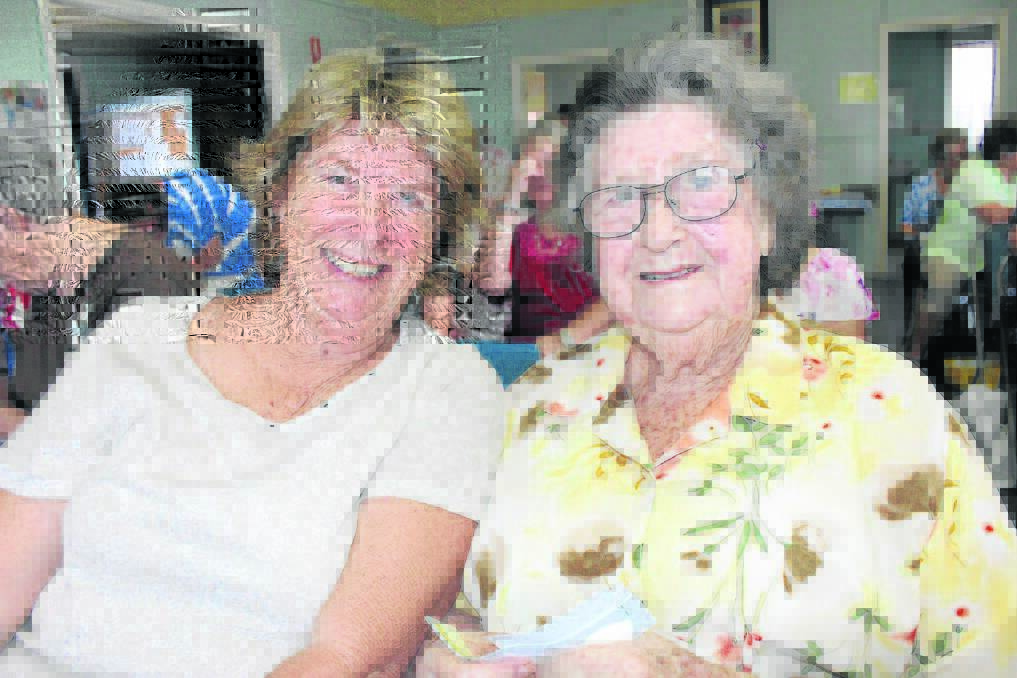 Park Ridge woman Maxine Christensen and Gleneagle's 
Noreen Sendall attended the cent auction.