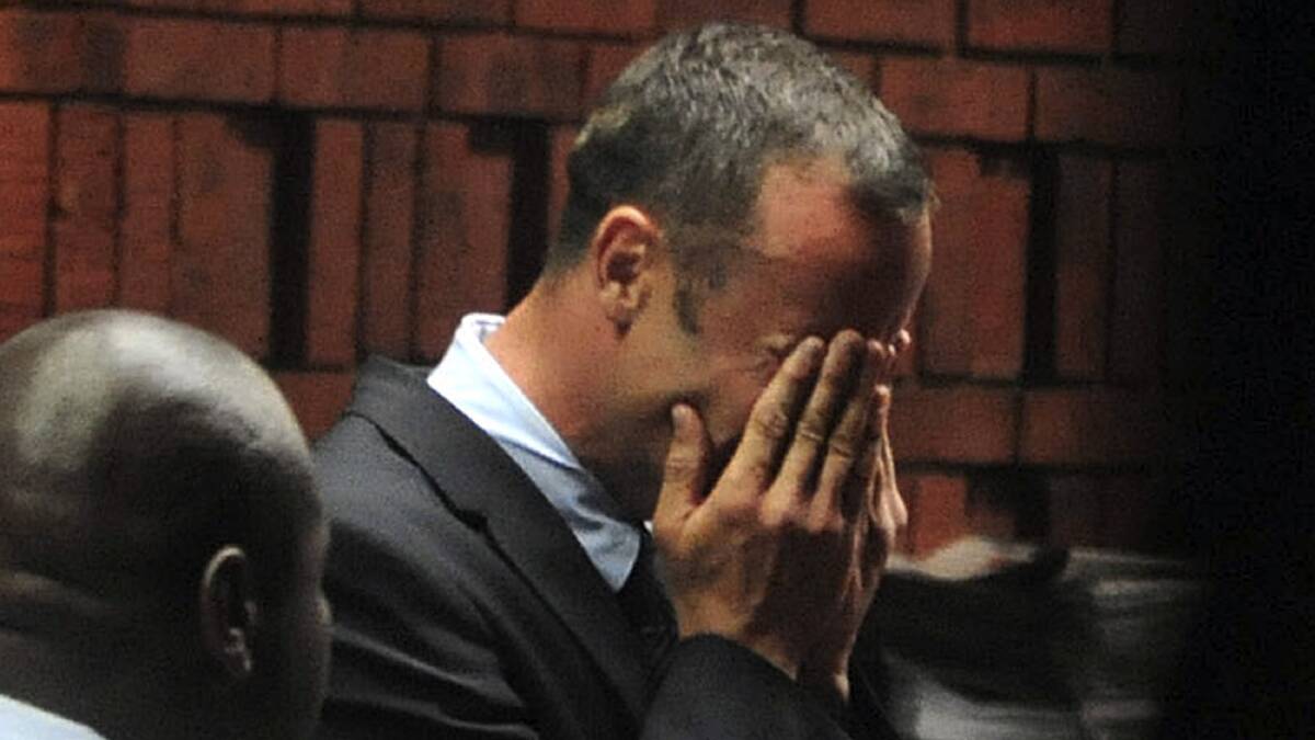Oscar Pistorius breaks down during his court appearance in Pretoria on February 15. Photo: REUTERS
