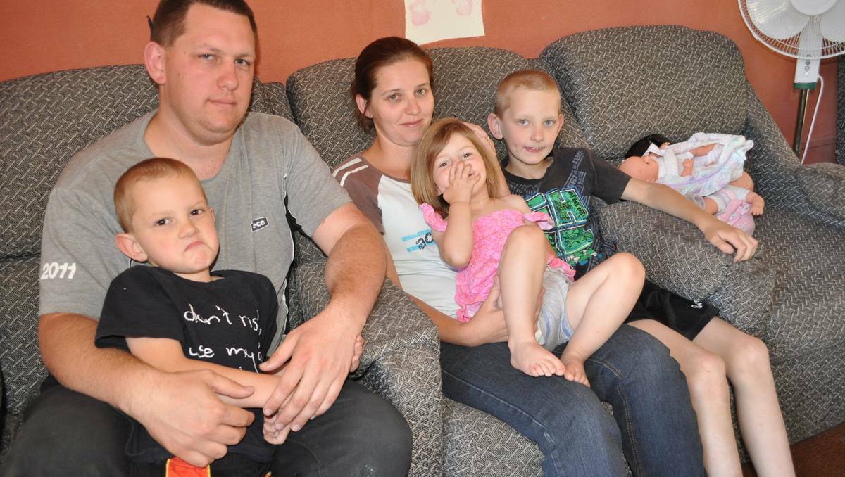 Geoff and Nicole McKenzie with their three children, Tyler, Elizabeth and Connor.