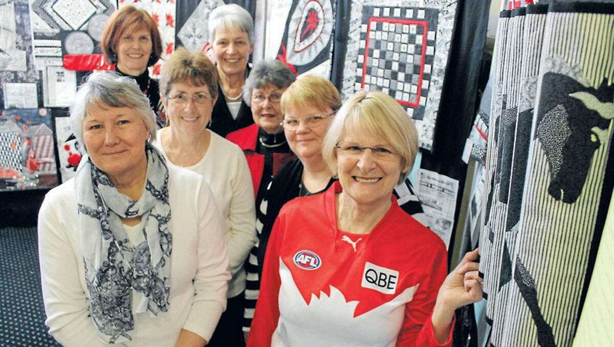 The Queanbeyan Quilters Inc at the launch of their "On This Day" exhibition at the Visitors Information Centre. Photo: Kim Pham. 