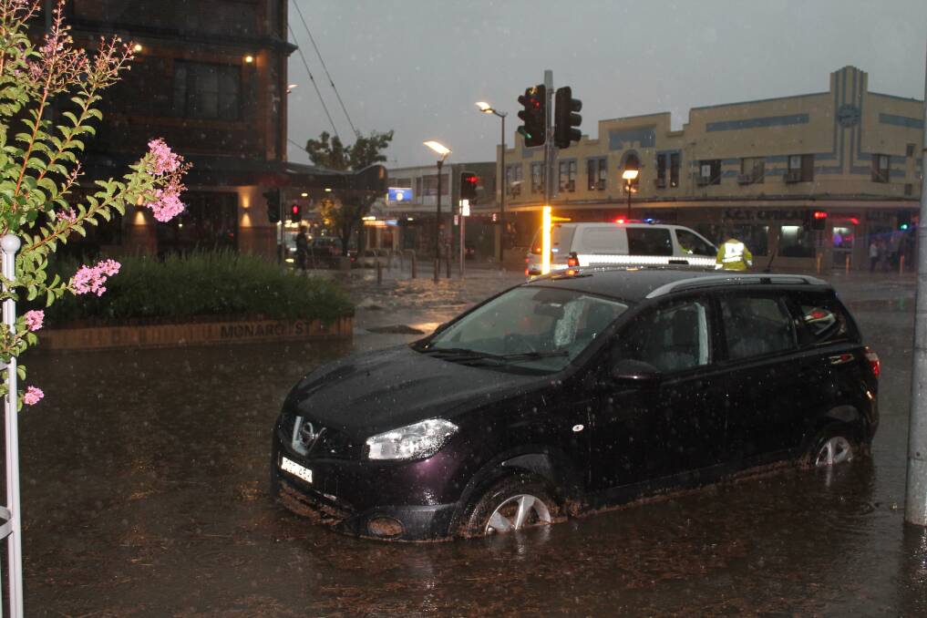 Cars were left stranded by the downpour. 