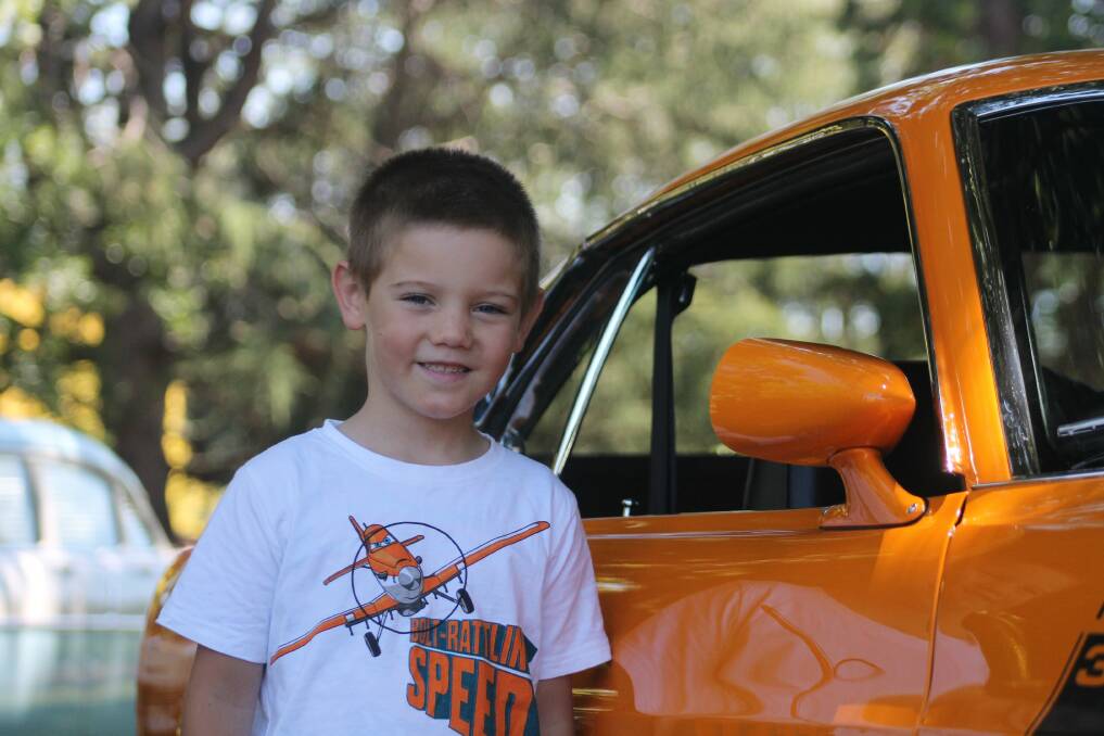 Aidan Marincel with his "favourite" car at the show. Photos: Andrew Johnston
