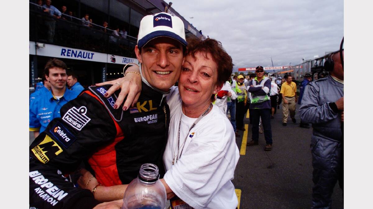 Mark Webber and mum Diane share a hug after his fifth place finish on debut at the Australian Grand Prix in 2002. Photo: Fairfax Media