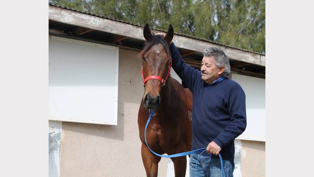 Queanbeyan trainer Mike Petrovic with last-start winner Laurie's Love. Photo: Andrew Johnston