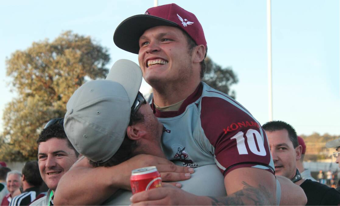 Queanbeyan Kangaroos prop Matt Lewis celebrates after his side's 17-16 victory over the Queanbeyan Blues in Sunday's Canberra Raiders Cup grand final at Seiffert Oval. Photos: Andrew Johnston, Queanbeyan Age