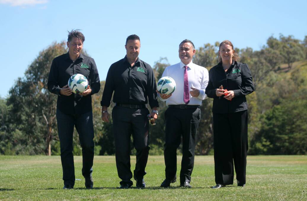 Monaro Panthers technical director Njegosh Popovich, vice president Michele Biscotti, State MP John Barilaro and Panthers Women's Premier League coordinator Carol Harper at Wright Park. The NSW State Government has pledged $78,000 to help renovate the ground to make it suitable for soccer. Photo: Andrew Johnston