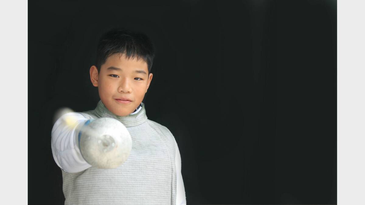 Kevin Park competes in the under-13s epee and foil competitions. Photos: Andrew Johnston, Queanbeyan Age