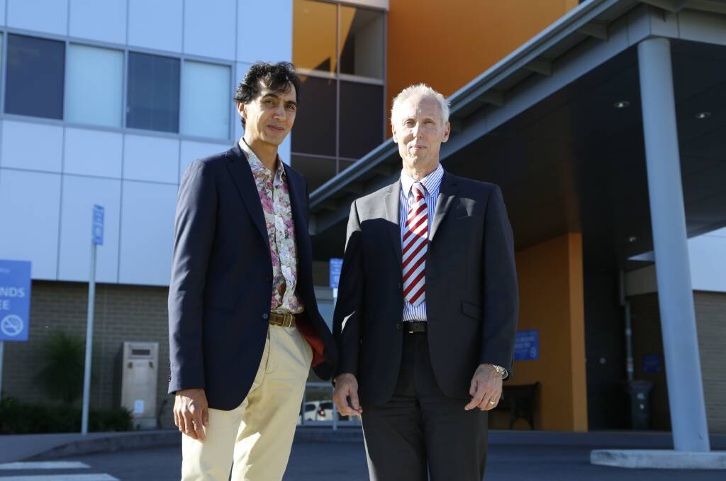 Chair of the Queanbeyan Medical Staff Council Dr Anthony Stevenson with chief executive of Southern NSW Local Health Dr Max Alexander. Photo: Andrew Johnston, Queanbeyan Age