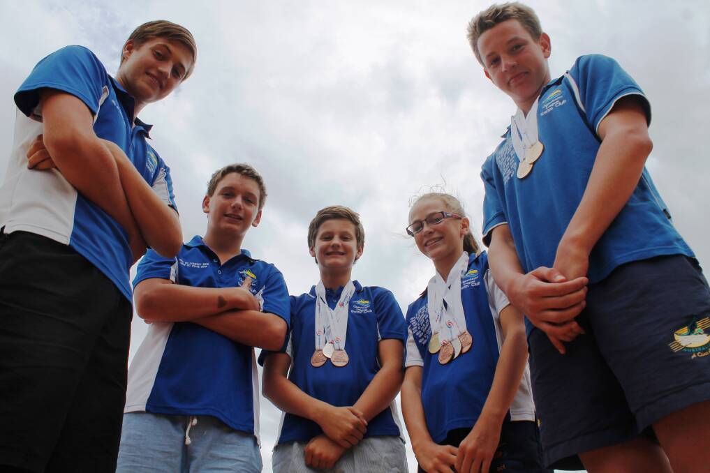 Queanbeyan swimmers Oliver Glamcevski, Alex Lakic, Brad Rauter, Claire Molineux and Andrew Catchpole. Photo: Andrew Johnston