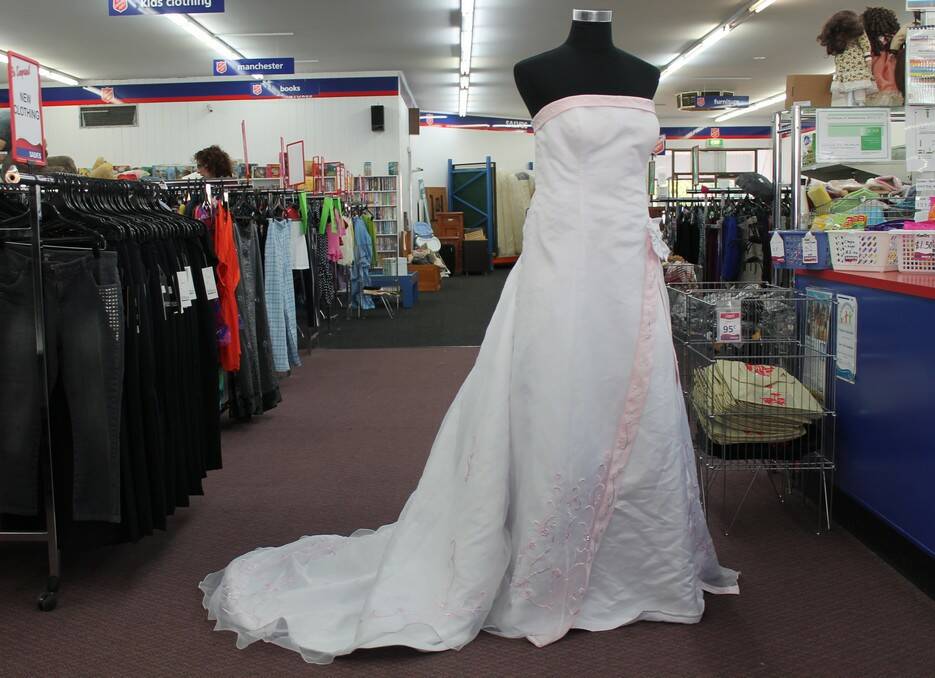 This brand new wedding dress retailing for $500 is one of the many gems waiting to be bought in a Queanbeyan op shop.