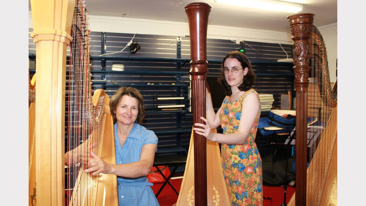 Alice Giles and Ingrid Bauer of harp ensemble She during rehearsal at the Queanbeyan Artists Shed.
