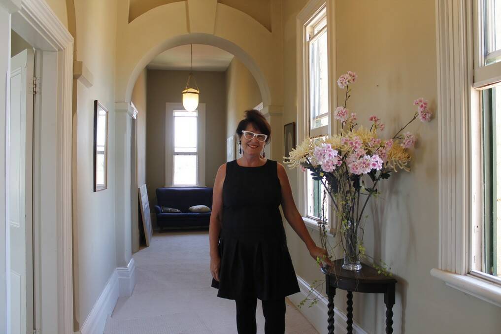 Benedict House owner Kate Shelton in her upstairs corridor, which runs the full width of the building.