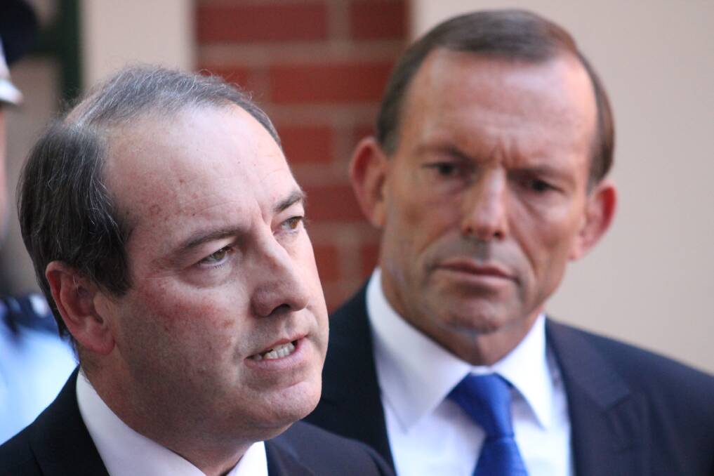Liberal member for Eden Monaro Peter Hendy and Tony Abbott in Queanbeyan earlier in the month.           Photo: Andrew Johnston.