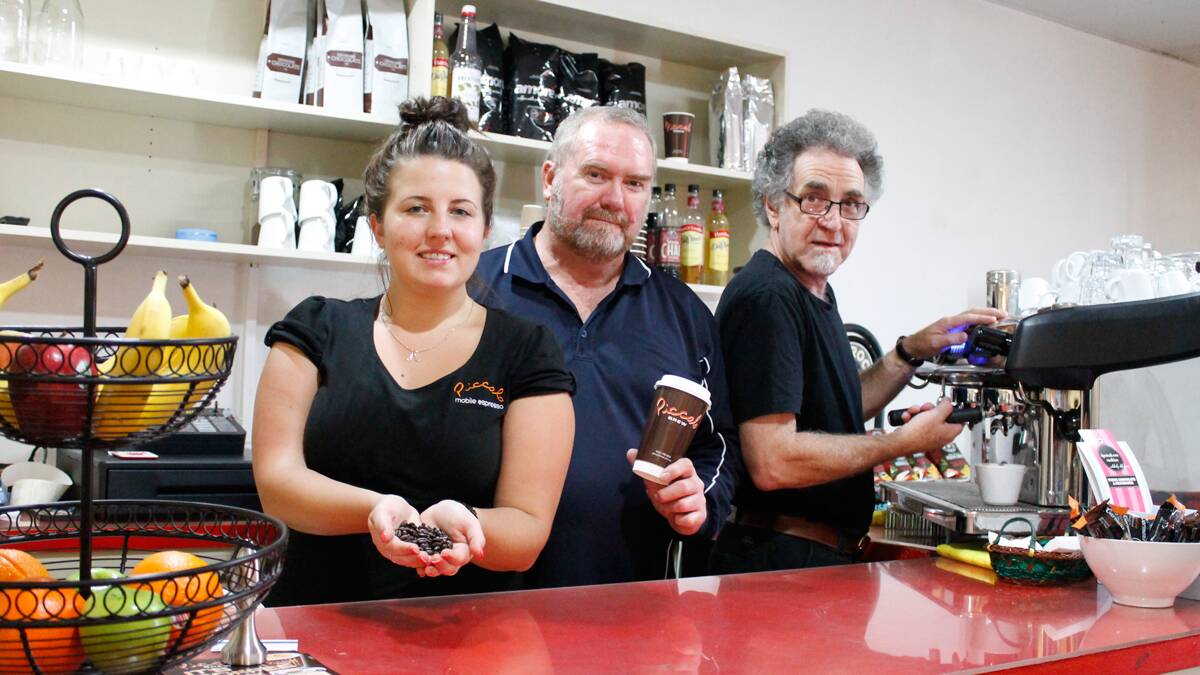 Glenn Wheymouth (centre) with baristas Aimee Goff and Mahesha at the new Queanbeyan cafe, Piccolo Brew.