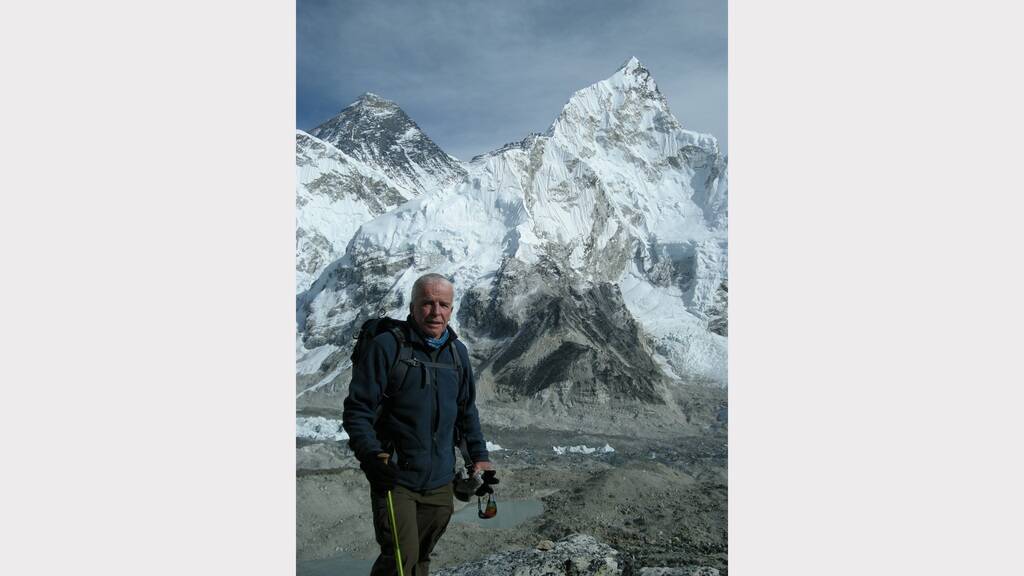 Former Queanbeyan resident turned career diplomat Howard Debenham (pictured at Mt Everest) has released a new book documenting his experience in the Foreign Service.