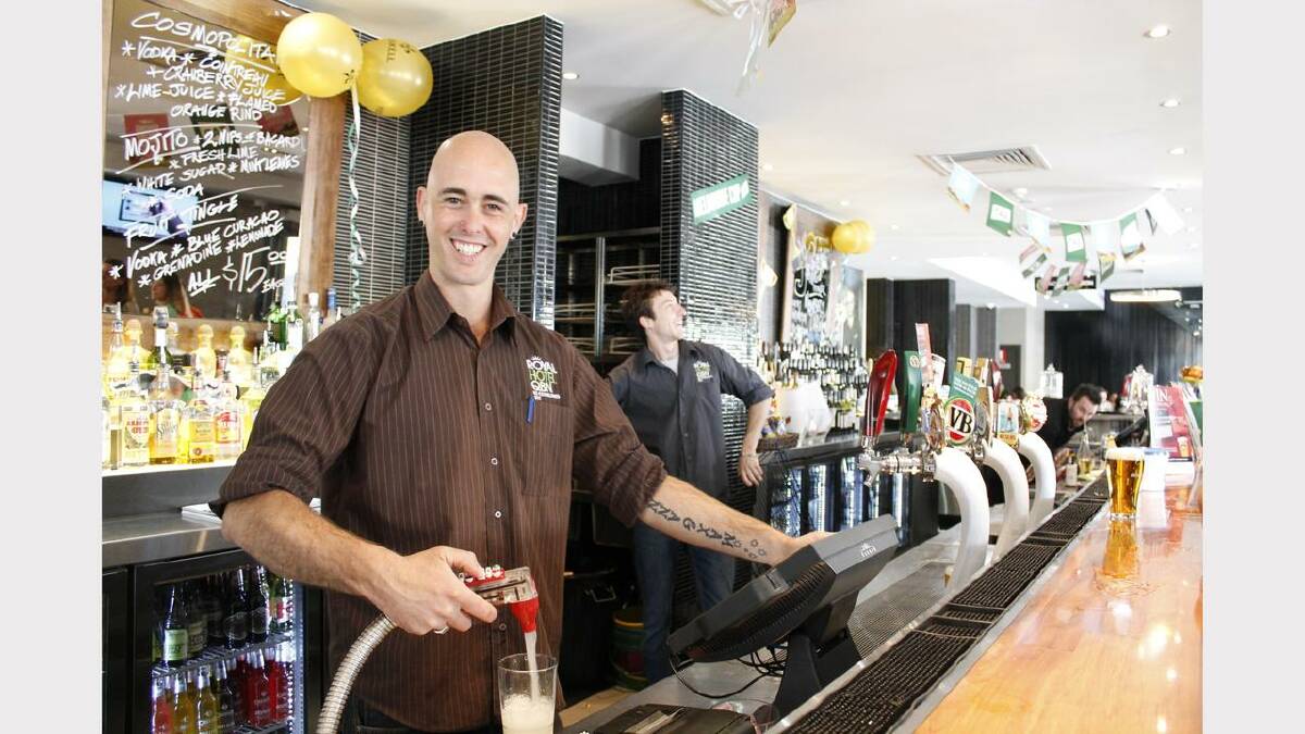 Guy Filmer pours his 1000th drink for the day.