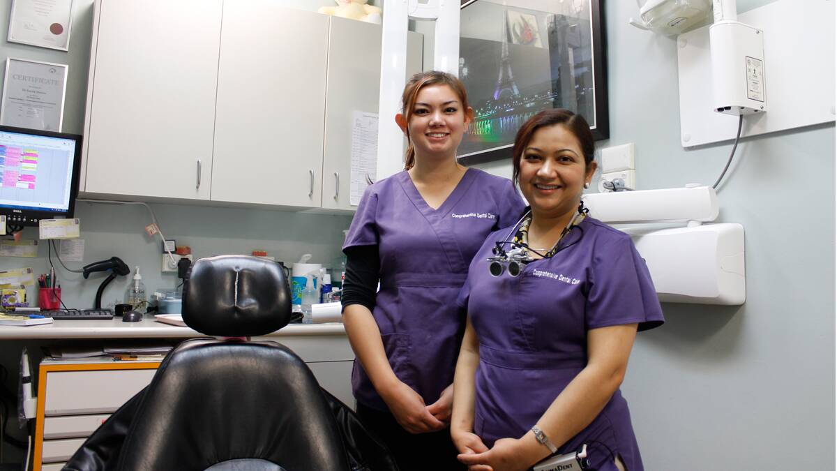 Comprehensive Dental Care owner Dr Sonika Sharma (right) with dental assistant Christine Fry.