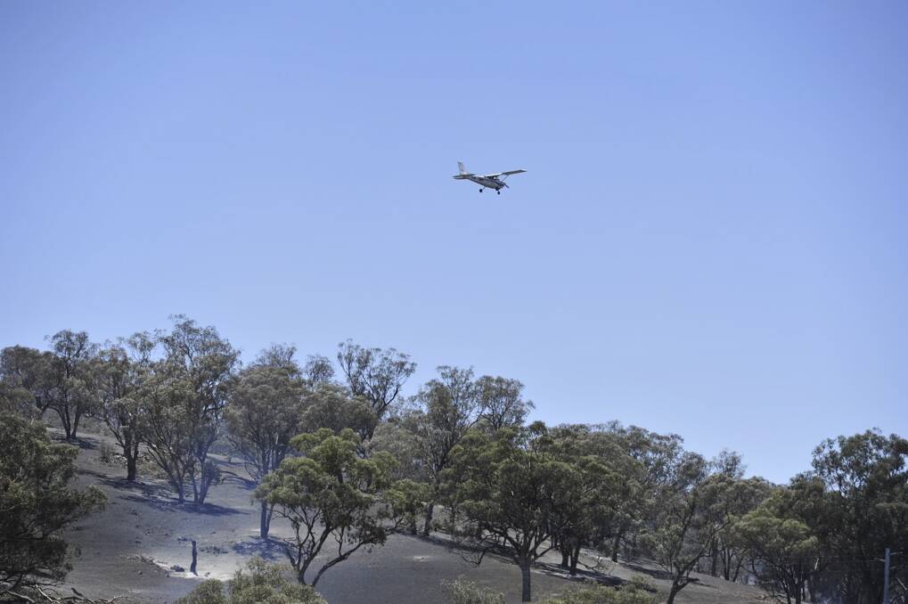Spotter plane near Jugiong after a fire went through a property on January 9, 2013. Photo: Jay Cronan/The Canberra Times