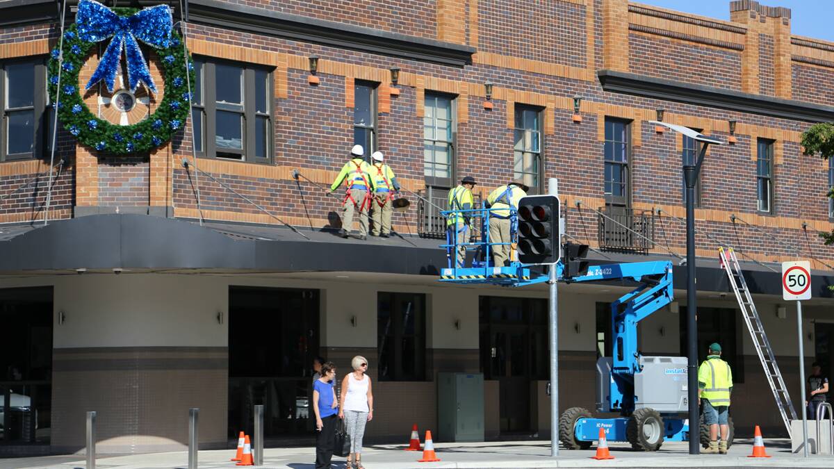 Queanbeyan City Council workers gave the Royal Hotel the Christmas treatment in early December. Photo: Kim Pham.