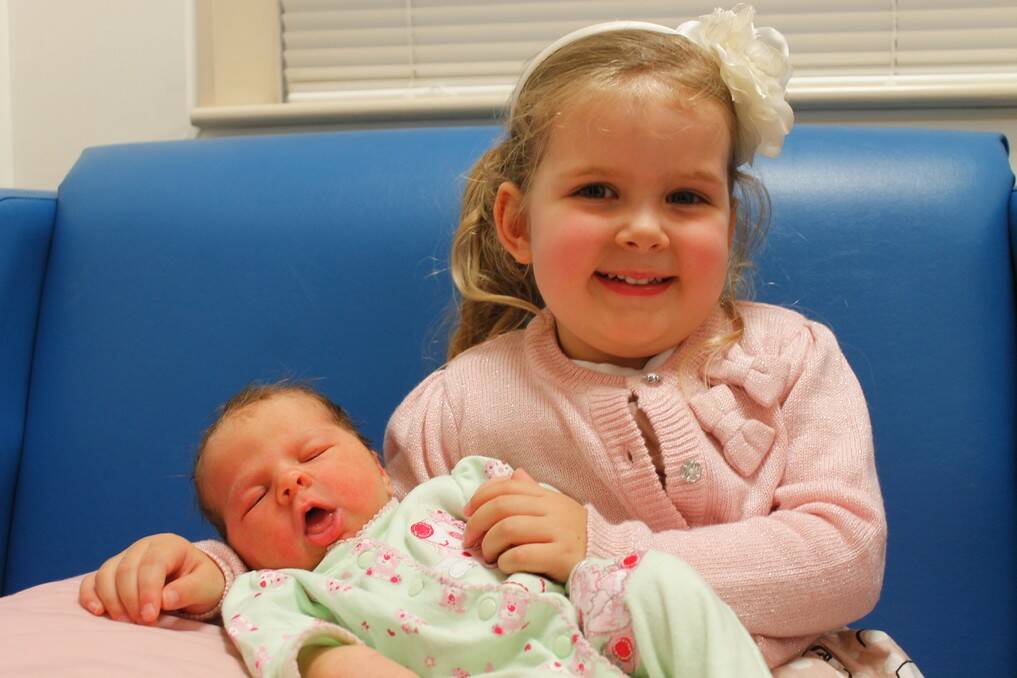 Elliott holds baby Jessica Susan Eva Owen born on April 21