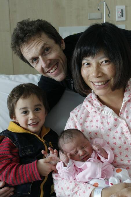 Parents Richard Snashall, Kelly Chang and brother Barry with baby Lily born on July 30.