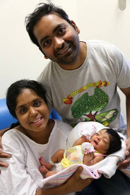 Srinivas and Sirisha Narra with their baby girl born on November 29.