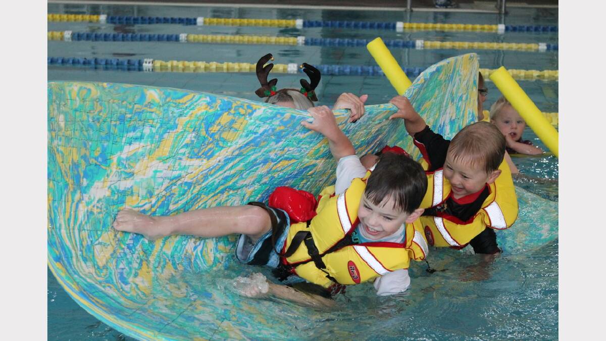 Fun in the pool. Harry Challen, 4 and Marley Ransland, 4 learning to swim and stay safe in the water. Photo: Russell Ayres.