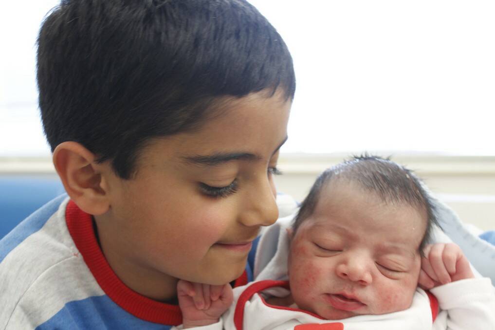Brother Kanwarbir cuddles baby brother Samarbir Singh born on July 9.