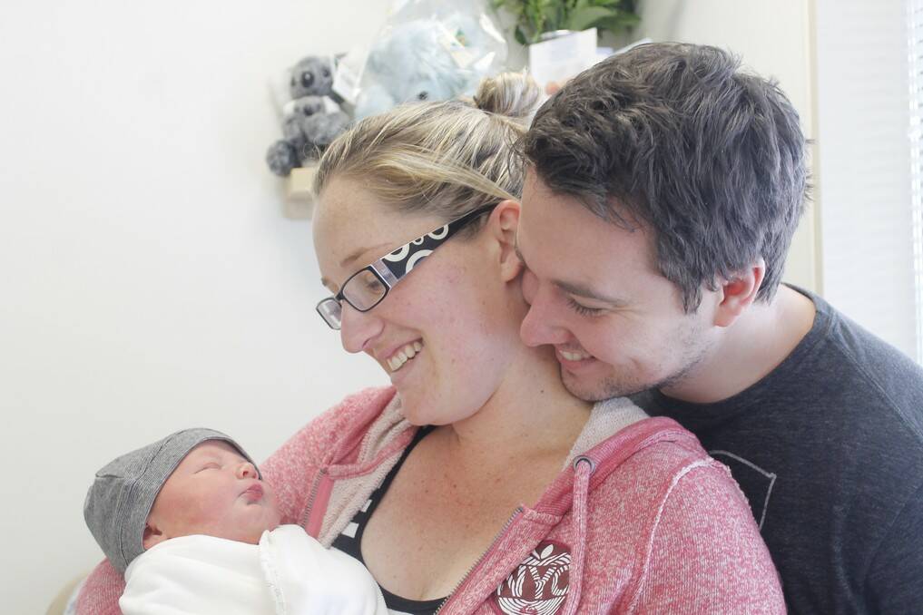 Queanbeyan parents Mitch and Janessa Docking and their first born son Elliott Ivo Docking born on July 14.