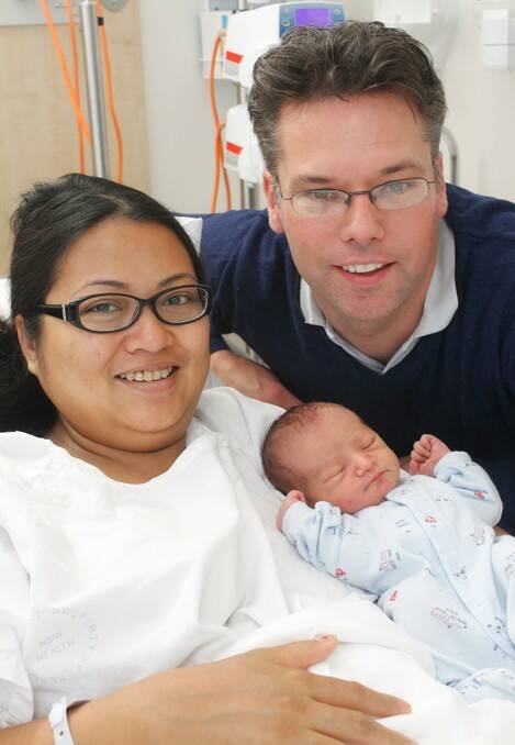 Andrew and Elaine Flahive with their first born son Dennis Andrew born on July 16.