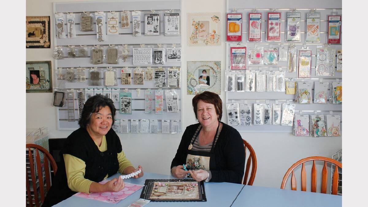 Craftyas scrapbooking teacher Bridget Larsen and owner Ann-Maree McKay share the joy of craft.